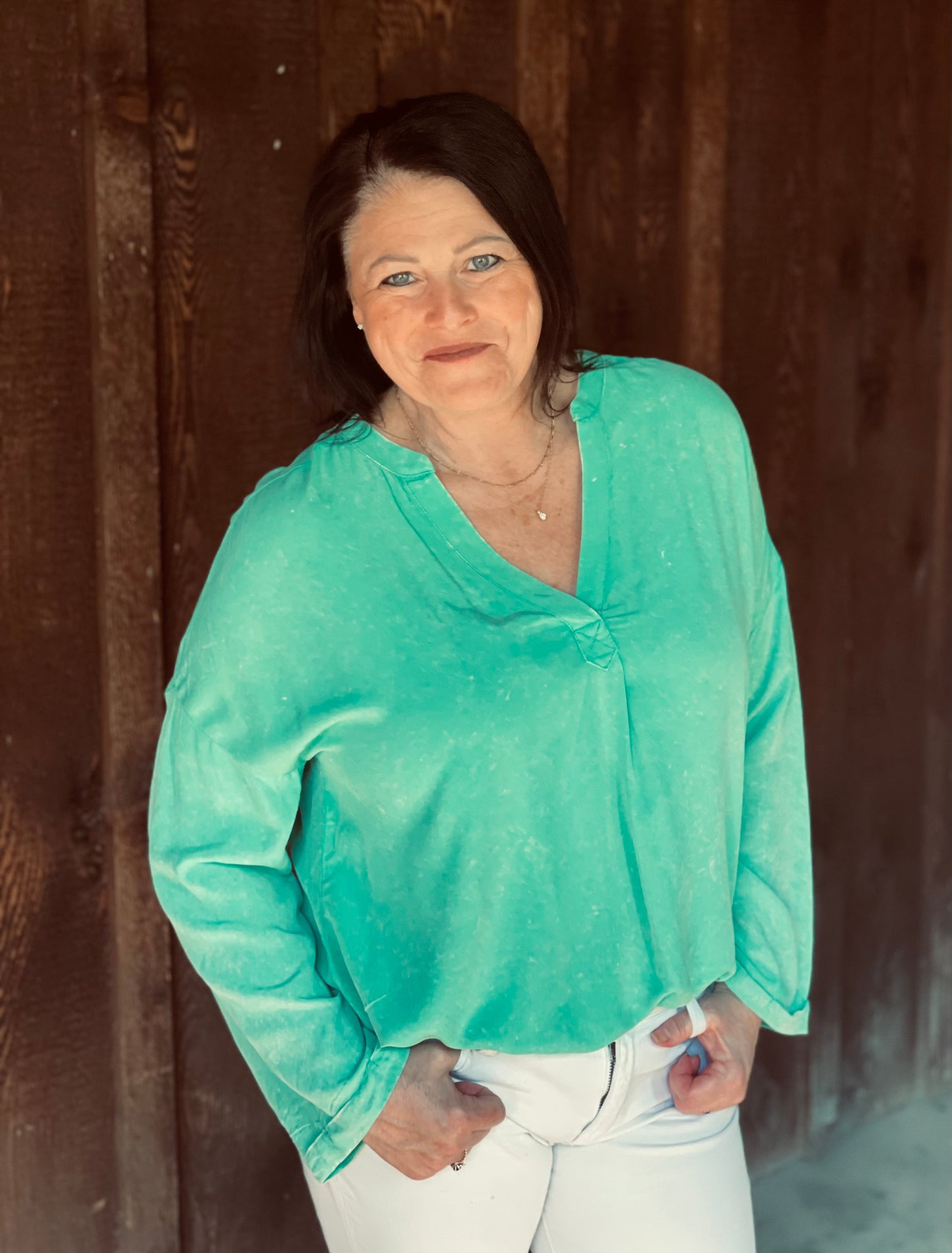 teal v neck shirt