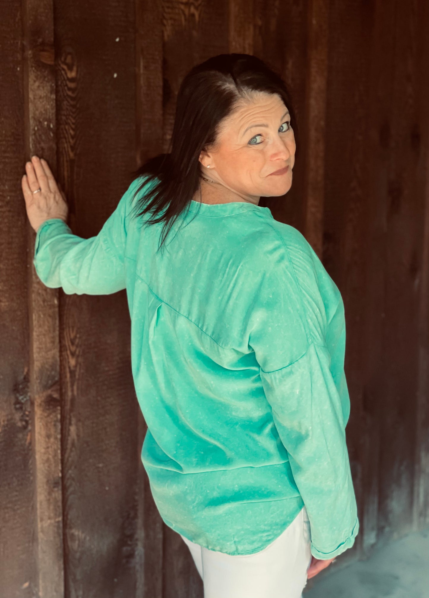 teal v neck shirt