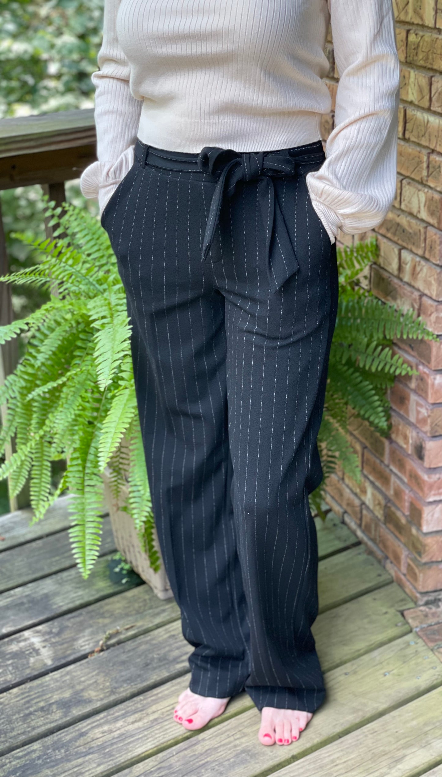 Black pinstriped pants