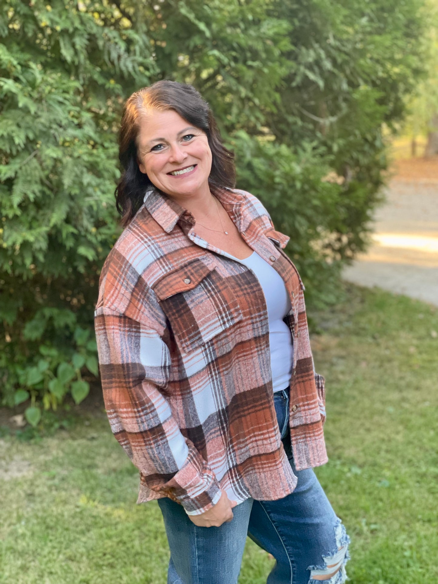 orange/brown/cream plaid shirt