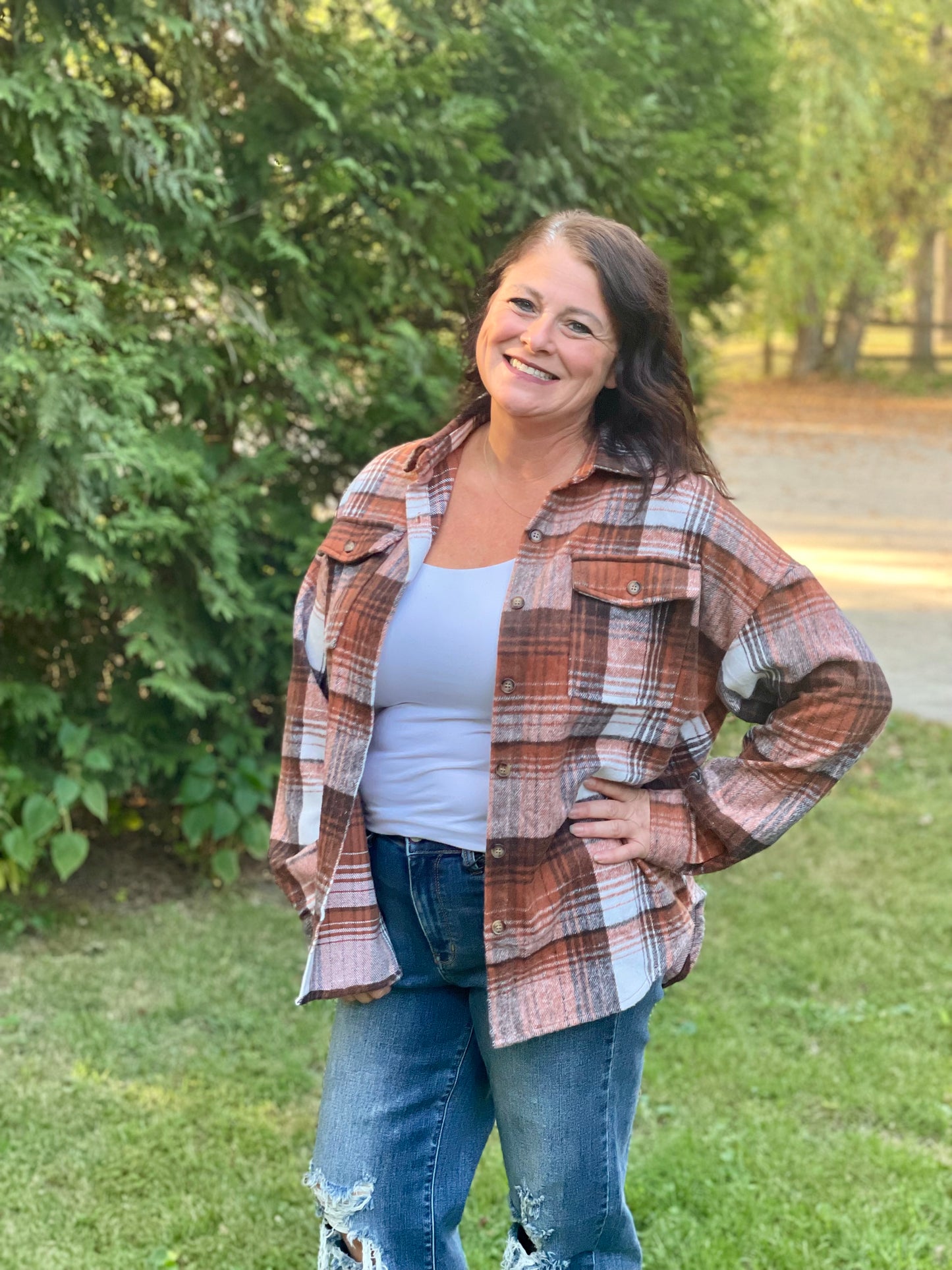 orange/brown/cream plaid shirt