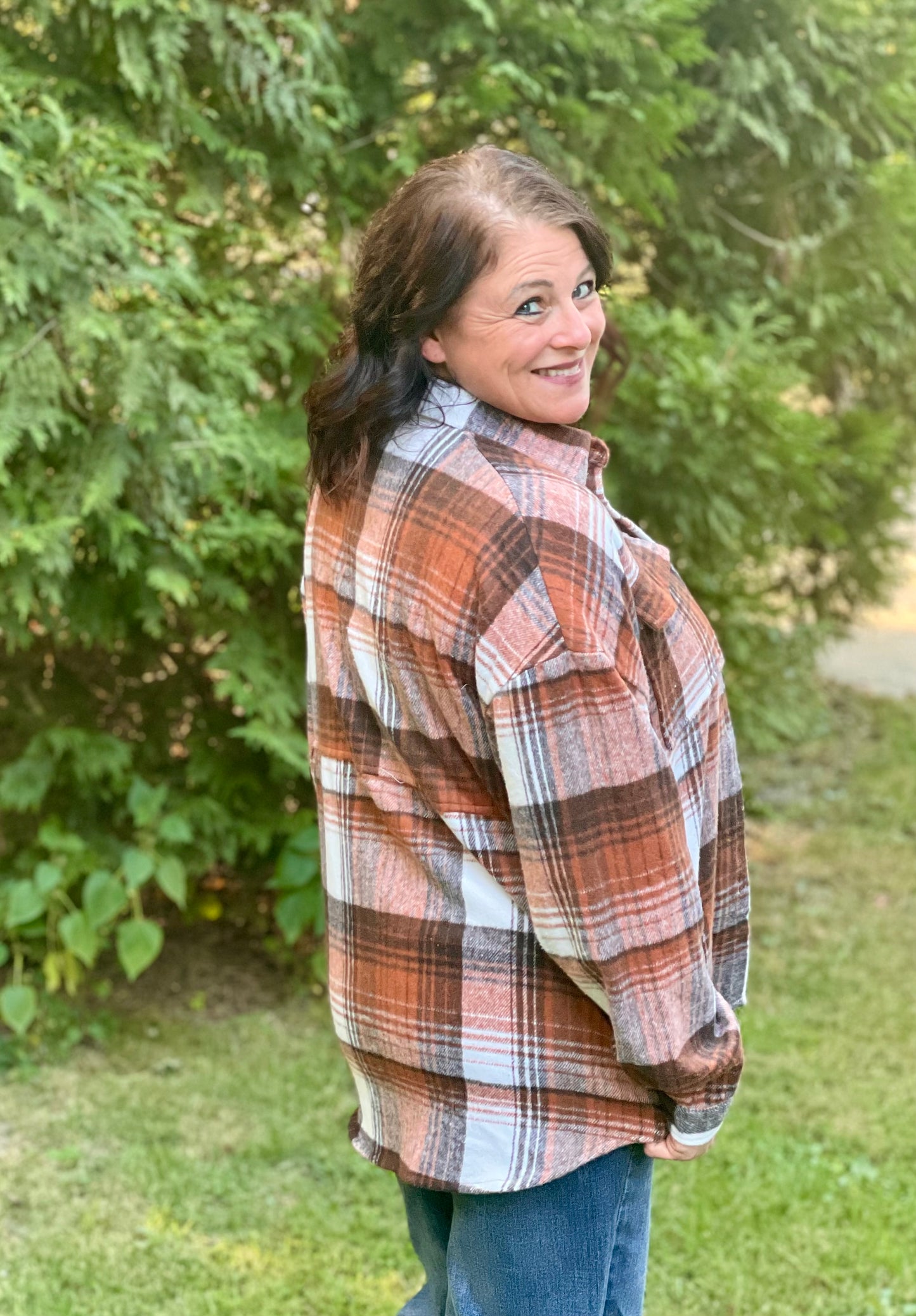 orange/brown/cream plaid shirt